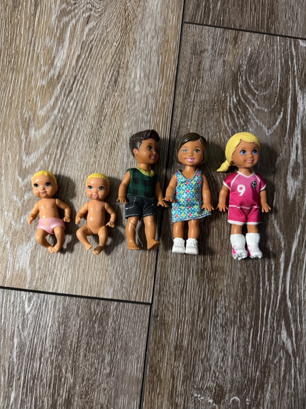 Lot of Barbie siblings and babies.